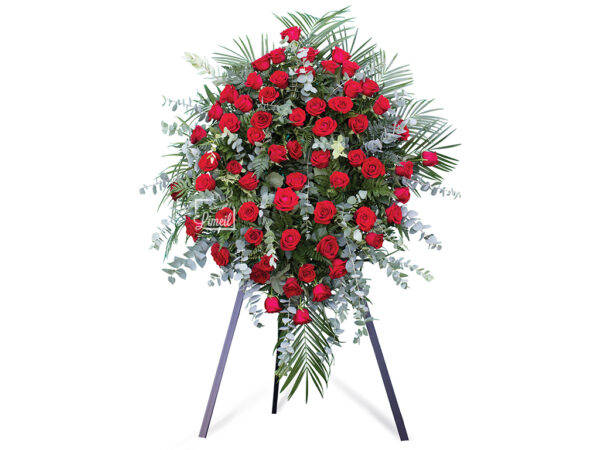 Couronne sur pieds roses rouge proposé par les pompes funèbres loic pour obsèques